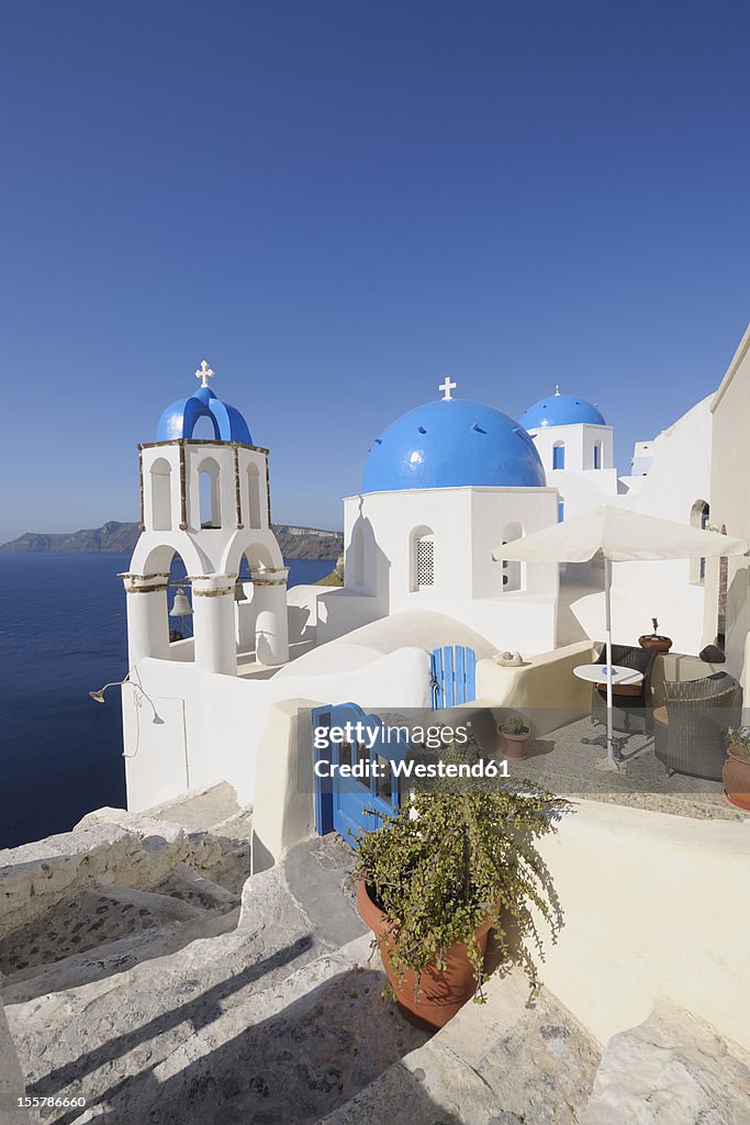 Greece, View of whitewashed church and bell tower at Oia