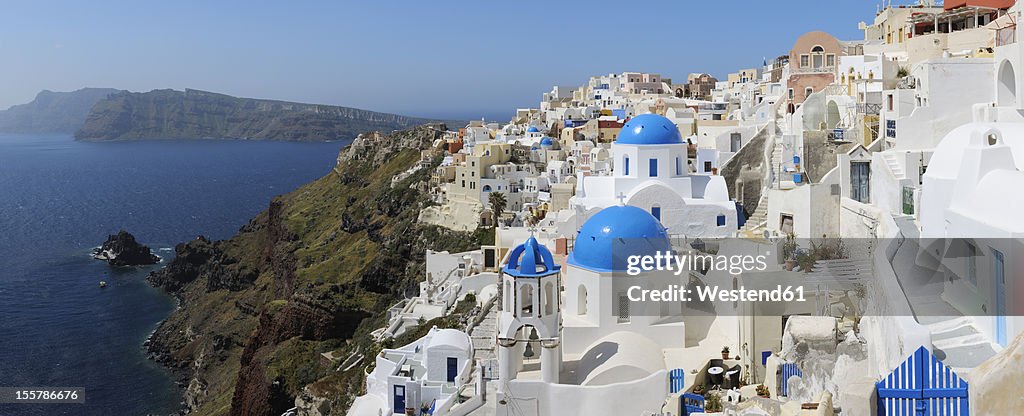 Greece, Santorini, View of classical whitewashed church and bell tower at Oia