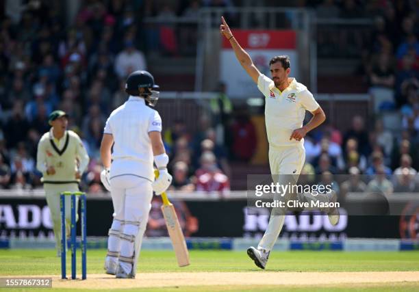 Mitchell Starc of Australia celebrates dismissing Ben Duckett of Englan during day two of the LV=Insurance Ashes 4th Test Match between England and...