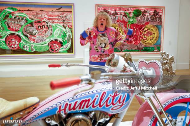 Sir Grayson Perry poses during a photo call for his Smash Hits exhibition being held in Royal Scottish Academy on July 20, 2023 in Edinburgh,...