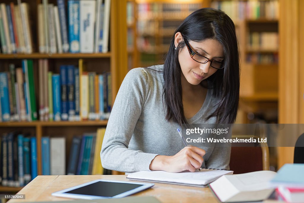 Woman studying in the library