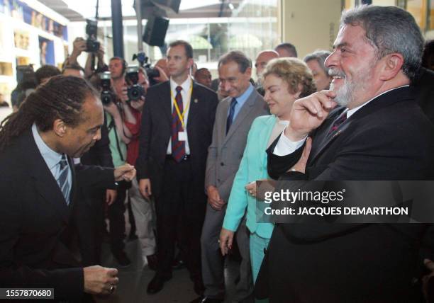 Brazilian President Luiz Inacio Lula da Silva , his wife Marisa Leticia , Paris' mayor Bertrand Delanoe and Brazilian culture minister and musician...