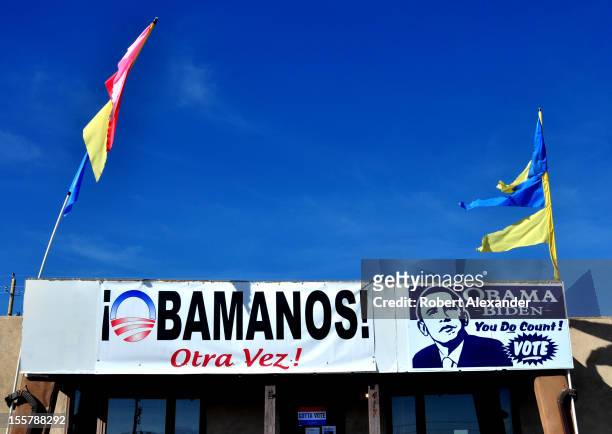 Sign at the Democratic Party's headquarters in Espanola, New Mexico, urges residents to vote for Barack Obama in the 2012 presidential election. A...