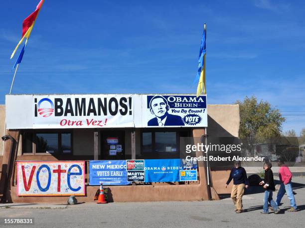 Barack Obama supporters visit the Democratic Party's headquarters in Espanola, New Mexico, a few days before the 2012 presidential election. A...
