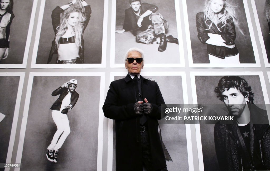 TOPSHOT-FRANCE-FASHION-BLACK-DRESS-EXHIBITION-LAGERFELD