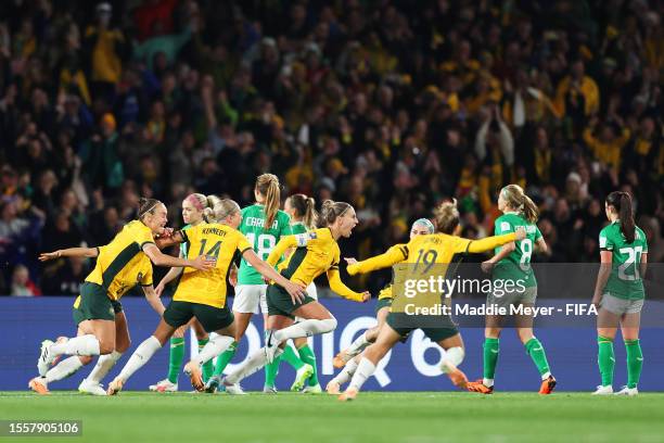Steph Catley of Australia celebrates with teammates after scoring her team's first goal during the FIFA Women's World Cup Australia & New Zealand...