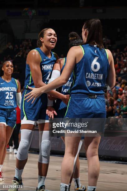 July 26: Napheesa Collier of the Minnesota Lynx and Bridget Carleton celebrate during the game against the Washington Mystics on July 26, 2023 at...