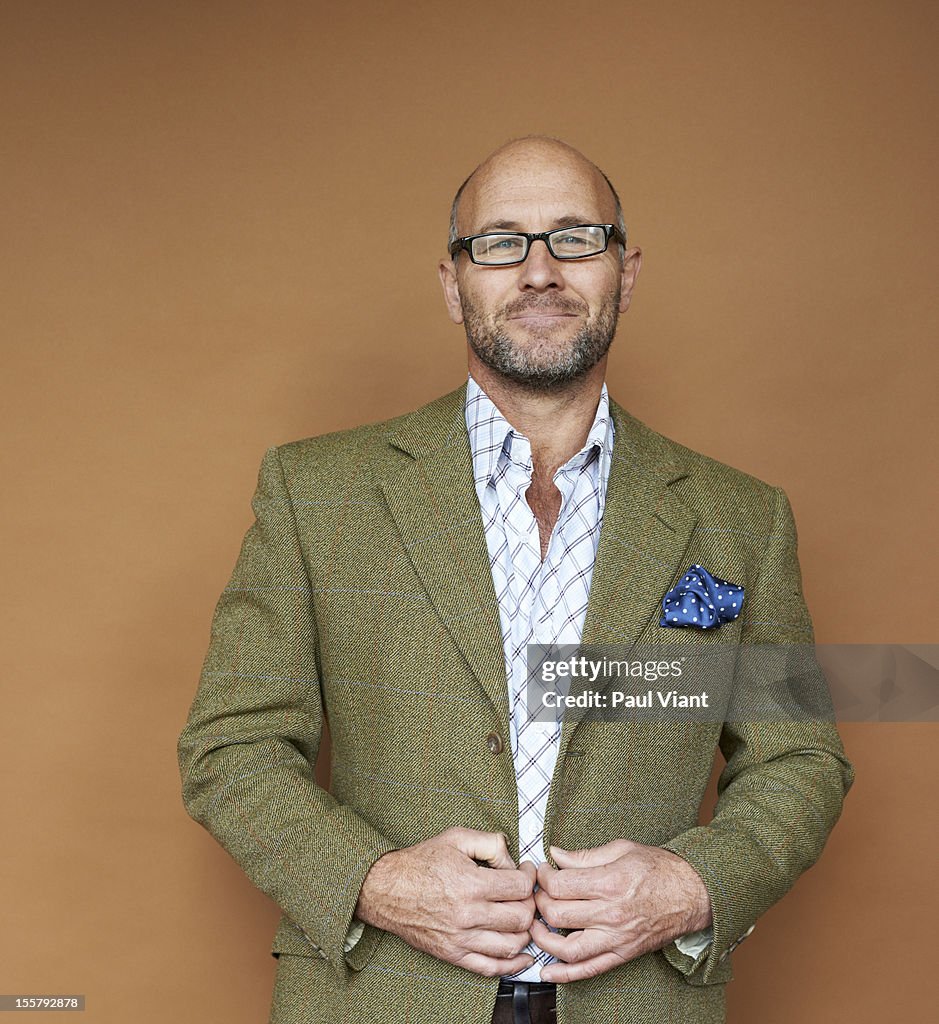 Portrait of mature man in tweed jacket