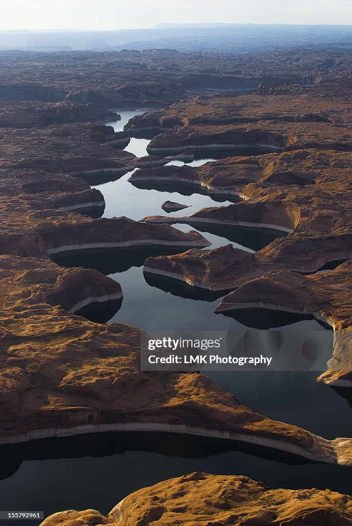 A View of Lake Powell from an Airplane at Sunrise