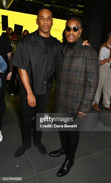 Reggie Yates and John Boyega attend launch of Lotus London, the first flagship in Europe for Lotus cars, on July 27, 2023 in London, England.