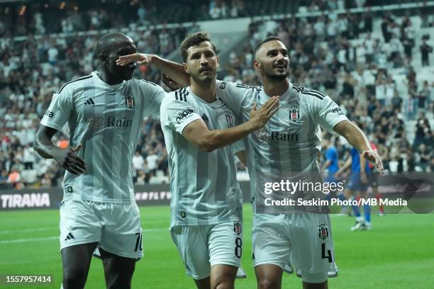 Onur Bulut of Besiktas celebrates after scoring the first goal of his team with Salih Ucan and Vincent Aboubakar during the UEFA Europa Conference...