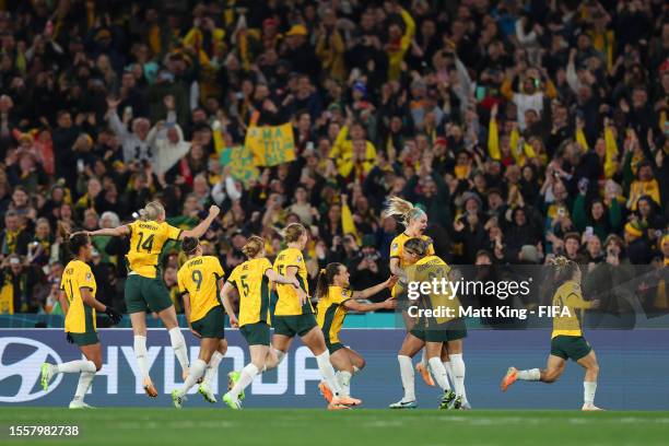 Australia players celebrate the team's first goal scored by Steph Catley during the FIFA Women's World Cup Australia & New Zealand 2023 Group B match...