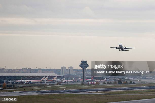 An Iberia plane takes off from Barajas Airport on November 8, 2012 in Madrid, Spain. Spanish airline Iberia, which partnered with British Airways...