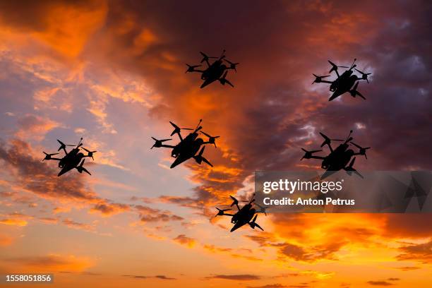 fpv kamikaze drones at sky. drones at war - fight or flight stock pictures, royalty-free photos & images