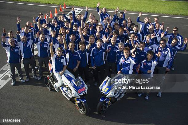 Jorge Lorenzo of Spain and Yamaha Factory Team and Katsuyuki Nakasuga of Japan and Yamaha Factory Racing pose with the bikes and team in order to...
