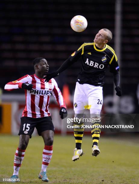 Eindhoven's defender Jetro Willems vies for the ball with AIK Solna's midfielder Daniel Gustavsson during the UEFA Europa League Group F football...