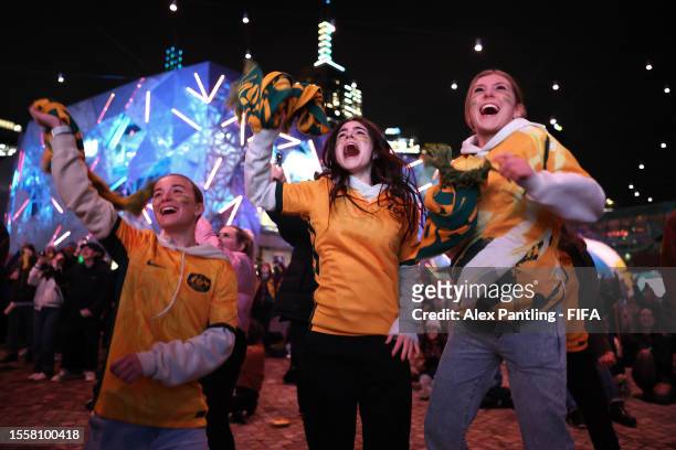 Supporters watch the Group B Match between Australia and Ireland at FIFA Fan Fest on July 20, 2023 in Melbourne, Australia.