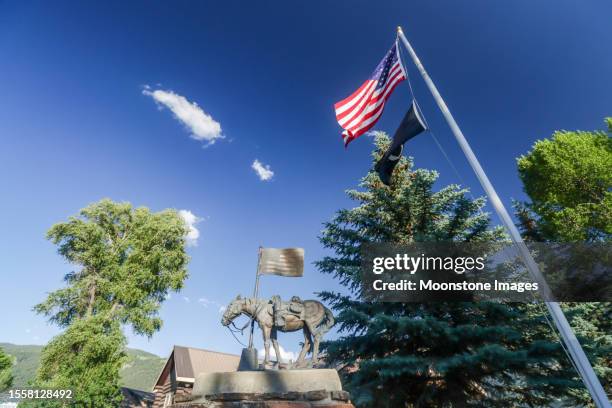 american flag at jackson hole american legion post no 43 in jackson at teton county, wyoming - war memorial stock pictures, royalty-free photos & images