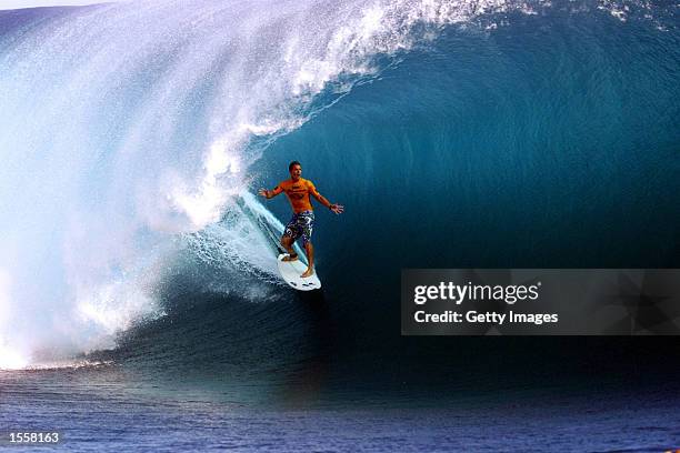 Andy Irons of Hawaii in action to win first place in the qualifly rounds of the Gotcha Pro Tahiti held in Teahupoo, Tahiti, French Polynesia. DIGITAL...