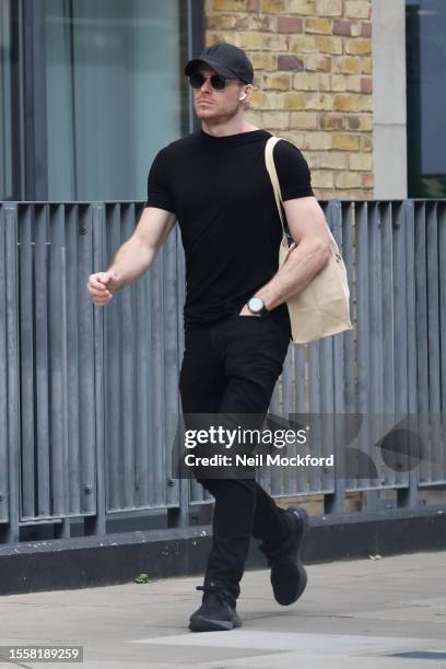 Richard Madden seen walking through Marylebone on July 20, 2023 in London, England.