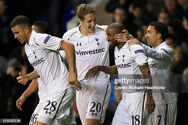 Jermain Defoe of Tottenham Hotspur celebrates scoring their second goal with Michael Dawson and Aaron Lennon of Tottenham Hotspur during the UEFA...