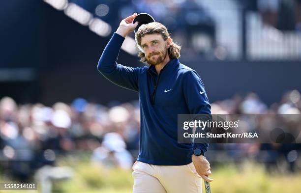 Tommy Fleetwood of England interacts with the crowd on the 18th green during Day One of The 151st Open at Royal Liverpool Golf Club on July 20, 2023...