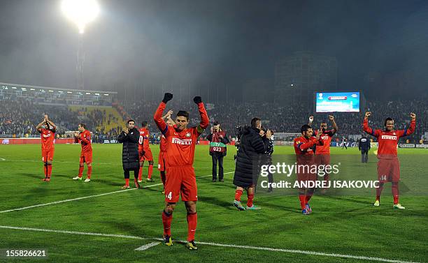 Inter Milan's Javier Zanetti and his teammates greet their supporters after the UEFA Europa League group H football match Partizan Belgrade vs FC...