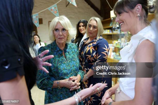 Queen Camilla meets with representatives and staff from Calan DVS, one of the largest domestic abuse charities operating in Wales, on July 20, 2023...