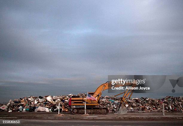 Debris from Superstorm Sandy is seen on a beach November 8, 2012 in Long Branch, New Jersey. The storm brought gusting winds, rain, and snow and...