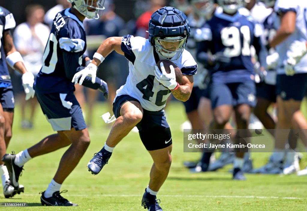 Running back Deuce Vaughn of the Dallas Cowboys carries the ball