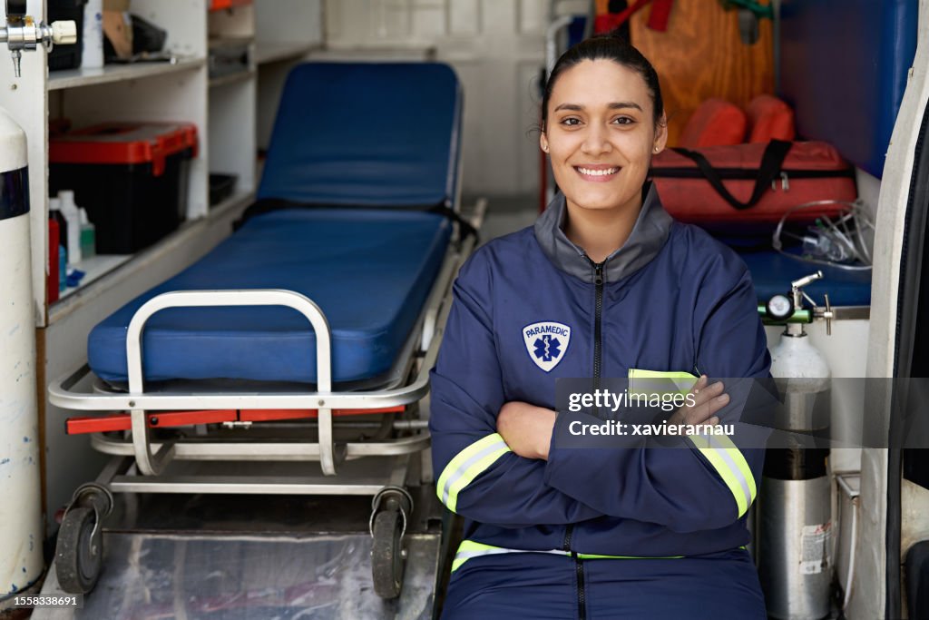 Occupation portrait of cheerful female paramedic