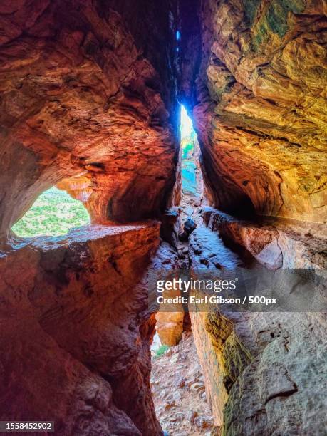 a cave full of colorful lights,sedona,arizona,united states,usa - sightseeing in sedona stock pictures, royalty-free photos & images