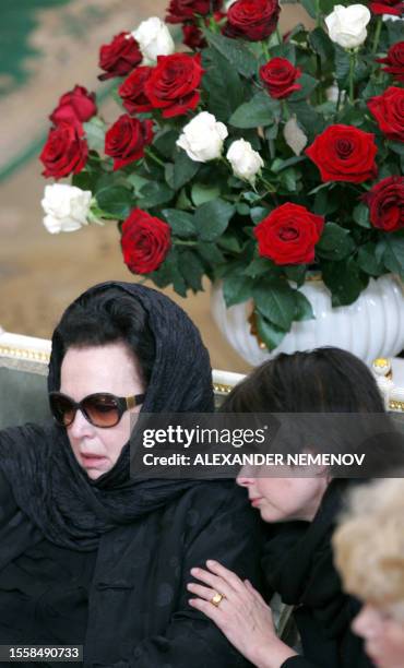 Galina Vishnevskaya , the widow and daughter Olga sit near the coffin of Mstislav Rostropovich, the legendary Russian cellist, during a farewell...