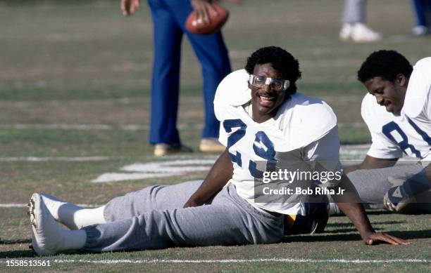 Los Angeles Rams Running Back Eric Dickerson warms up before practice at Rams facility at Cal State University Fullerton, December 6, 1984 in...