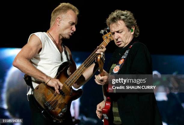 Sting, lead singer of the British rock band The Police and guitarist Andy Summers perform at the Twickenham stadium, west of London as part of their...