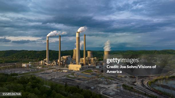 Aerial view of Jon Amos Power plant shows smoke stacks and cooling, Coal, Poca, West Virginia.