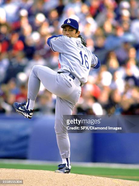 Hideo Nomo of the Los Angeles Dodgers throws a pitch during a game circa 1997.