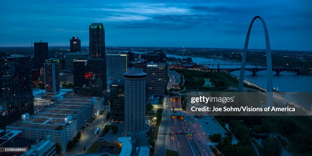 Dusk view of City of St. Louis skyline with Gateway Arch and Mississippi River, Missouri