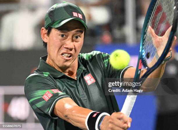 Kei Nishikori of Japan hits a shot against Juncheng Shang during the second round of the ATP Atlanta Open at Atlantic Station on July 27, 2023 in...