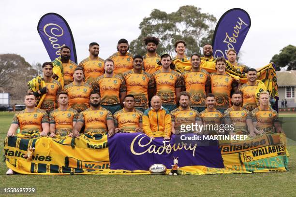 Australian players pose for a team photo during a training session at Brighton Grammar School in Melbourne on July 28 ahead of the Rugby Championship...