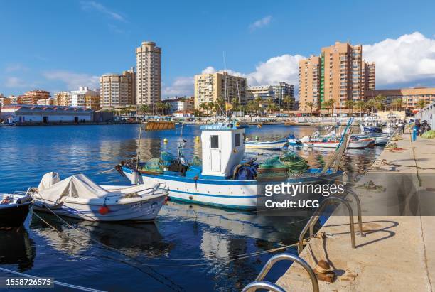 Fuengirola, Costa del Sol, Malaga Province, Andalusia, southern Spain. Boats in the fishing harbor.