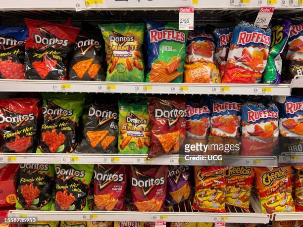 Super Hot and spicy flavored big brand potato chips by Doritos, Ruffles and Cheetos, Target Store, Queens, New York.