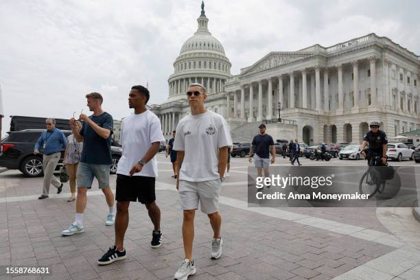 Arsenal FC players including Rob Holding, Jurrien Timber and Leandro Trossard walk across the East Front Plaza of the U.S. Capitol Building on July...