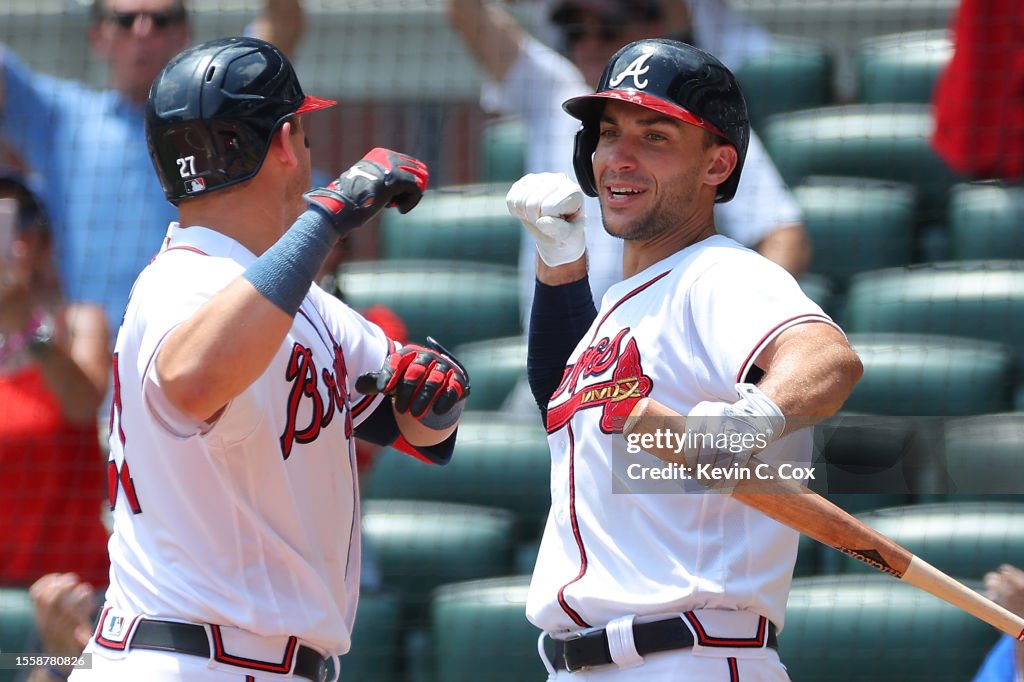 Roger Riley Arizona Diamondbacks Austin Riley of the Atlanta Braves reacts with Matt Olson after... News ...