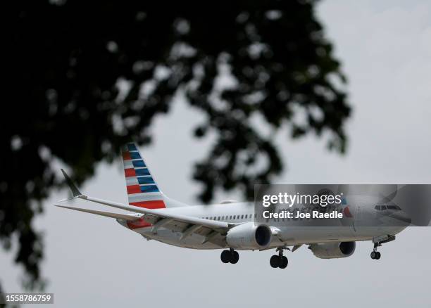 An American Airlines plane prepares to land at the Miami International Airport on July 20, 2023 in Miami, Florida. The company reported a record...