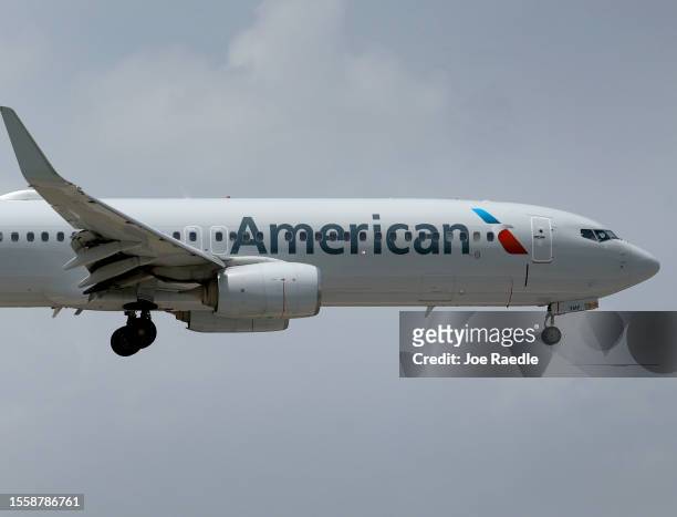 An American Airlines plane prepares to land at the Miami International Airport on July 20, 2023 in Miami, Florida. The company reported a record...