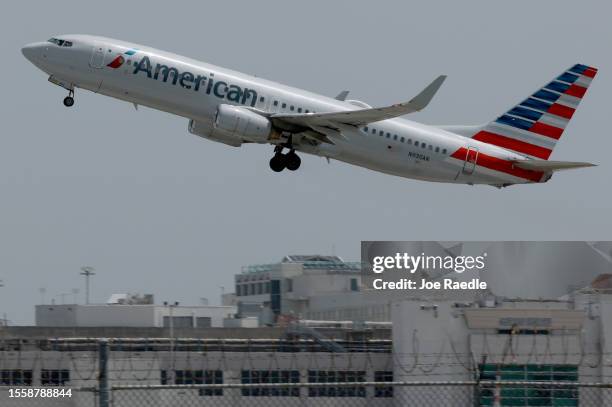 An American Airlines plane takes off from the Miami International Airport on July 20, 2023 in Miami, Florida. The company reported a record quarterly...