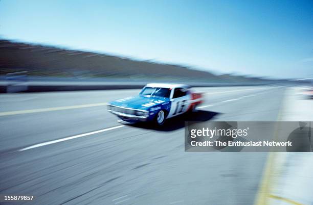 Miller 500 - NASCAR - Ontario Motor Speedway. Mark Donohue of Penske Racing driving his AMC Matador to empty grand stands. The photo was part of a...