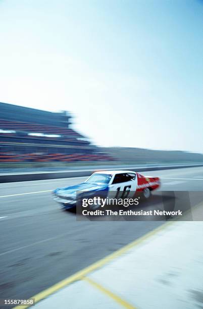 Miller 500 - NASCAR - Ontario Motor Speedway. Mark Donohue of Penske Racing driving his AMC Matador to empty grand stands. The photo was part of a...