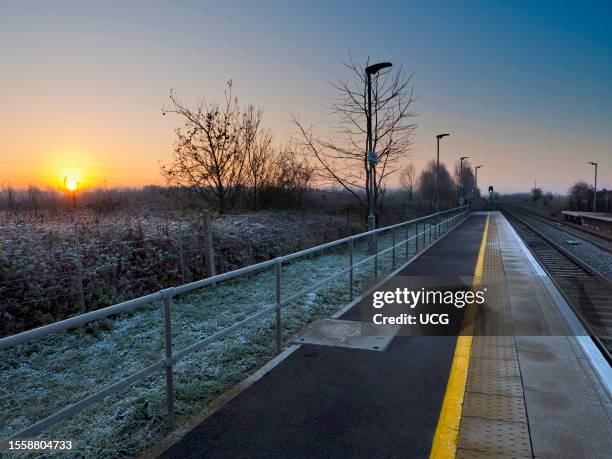 Glowing winter sunrise seen from the platform of Radley Station.